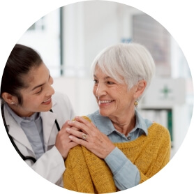 A healthcare provider greets a patient.